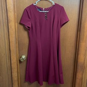 Dress. Size 10. Maroon. Sits above the knee.